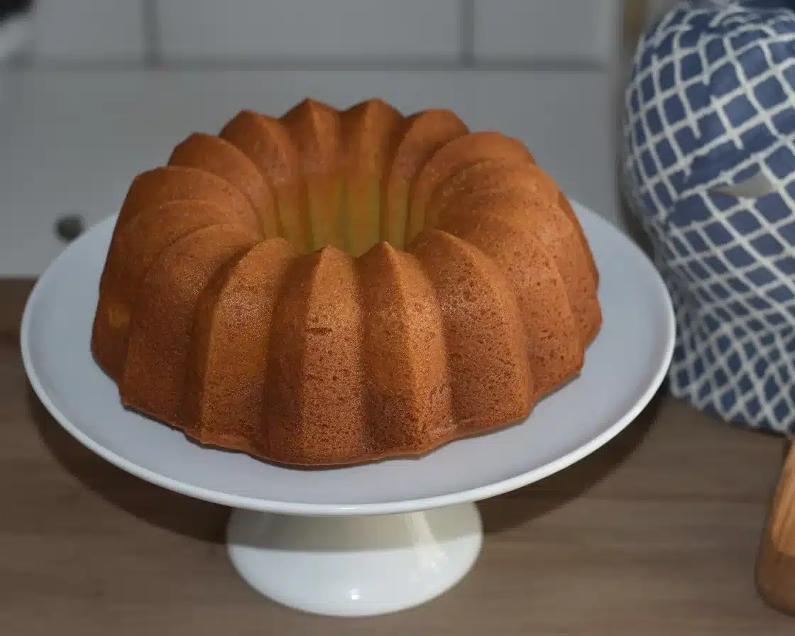 Delicious and moist crack cake made with yellow cake mix and vanilla pudding.