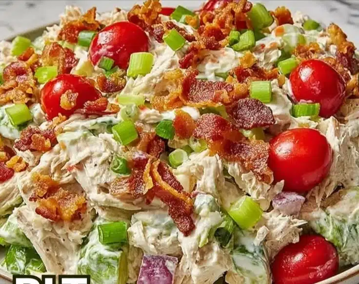 Delicious BLT Chicken Salad topped with crispy bacon and fresh ingredients