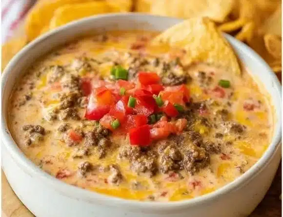 Delicious Classic Rotel Dip with Ground Beef served in a bowl