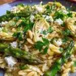 Colorful Mediterranean Orzo Salad with fresh vegetables and herbs