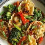 Delicious potsticker stir fry with vegetables and crispy dumplings