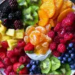 Colorful Rainbow Fruit Board with an assortment of fresh fruits