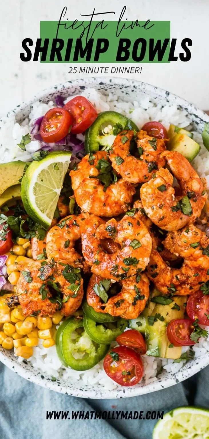 Delicious Fiesta Lime Shrimp bowl topped with fresh ingredients and lime slices