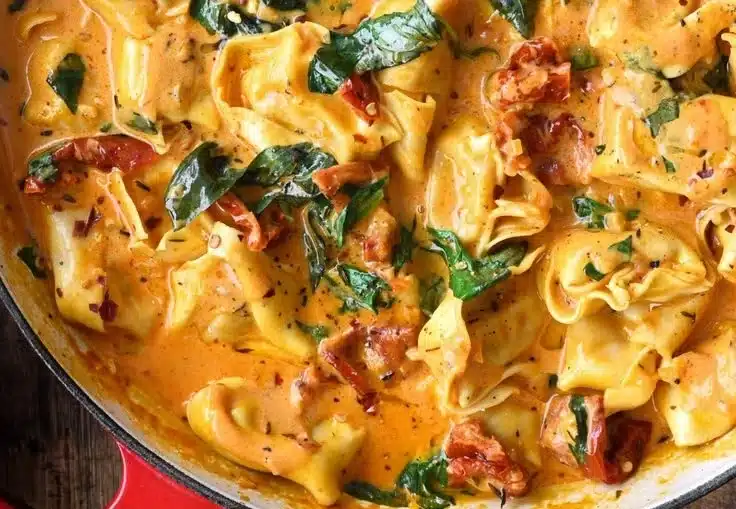 One-Pot Marry Me Tortellini dish served in a bowl garnished with herbs