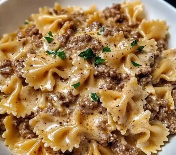 Creamy Parmesan Garlic Beef Bowtie Pasta served in a bowl