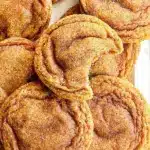 Batch of easy Pumpkin Snickerdoodle Cookies on a cooling rack
